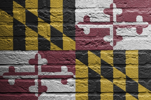 Brick wall with a painting of a flag isolated, Maryland
